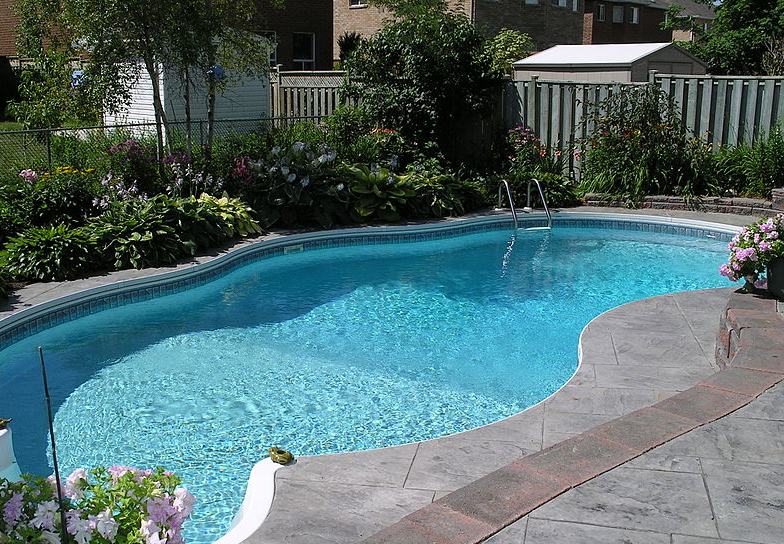 a clean backyard pool